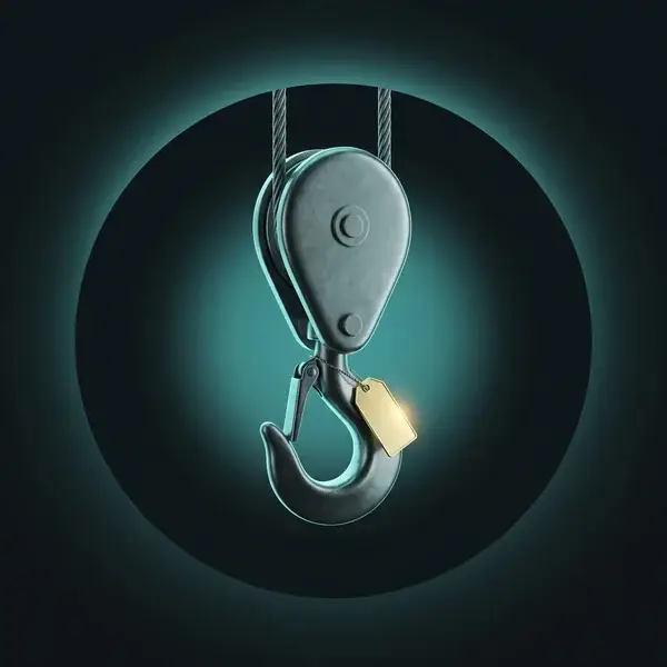Crane hook in service under a pulley block with a gold tag on its shank, showing integrated engineering solutions support