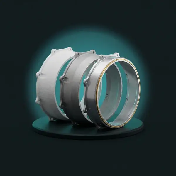 Bell housing prototypes in an arc, printed, cast, and machined: builds ranked by what they prove in prototype development