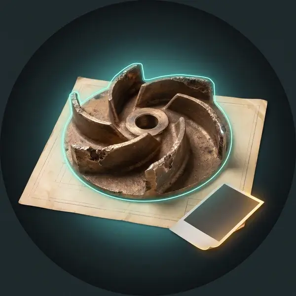 Worn bronze impeller on a faded drawing with a teal outline of its original shape: where reverse engineering services begin